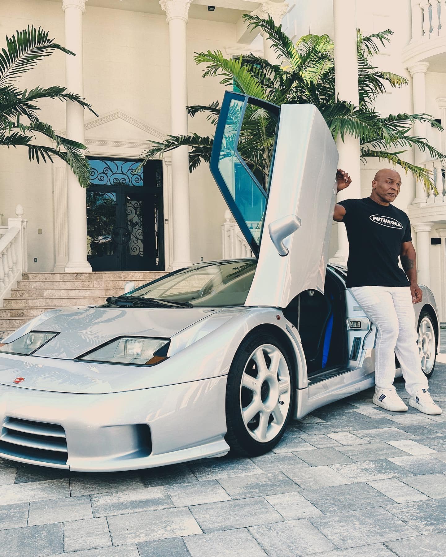 Mike Tyson Surprised The Whole World When He Gave Eminem A Super Rare Bugatti Eb 110 Supercar To Wish Him The Title Of The World's Most Classy Rapper And Collaborate On A New Song. - Car Magazine TV