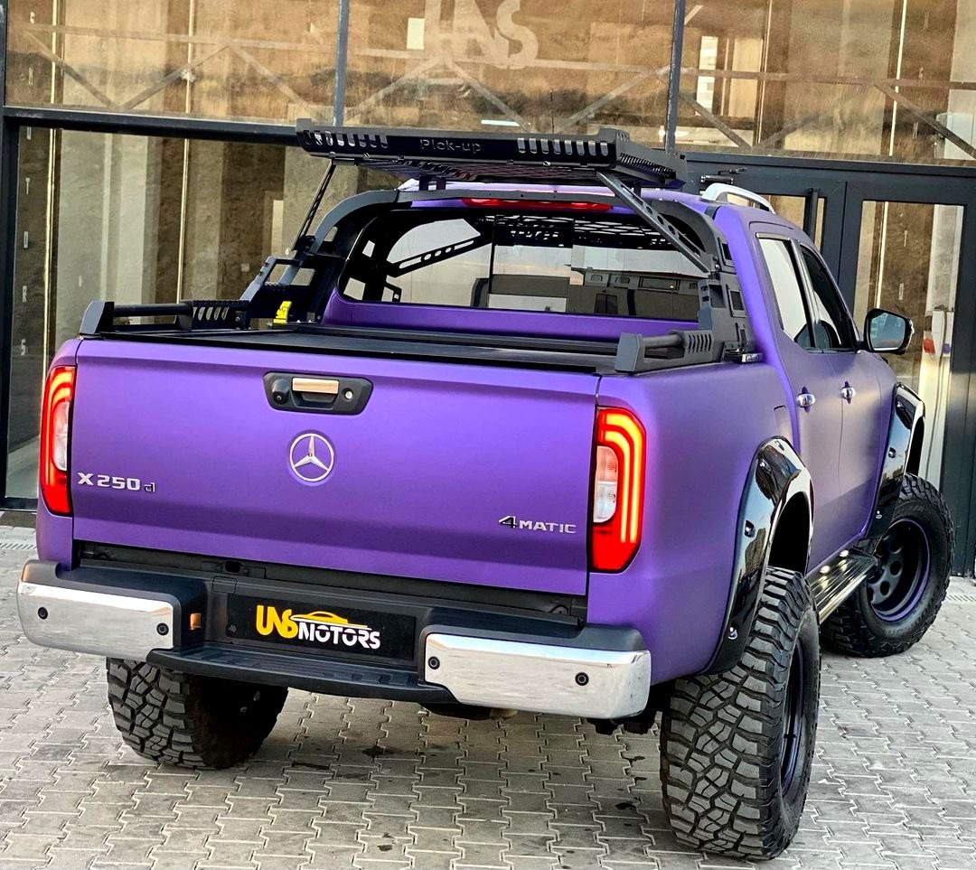 lamtac close up of the stylish purple mercedes x class carlex design exy extreme off road pickup truck known as the unique street monster 653b7283ad289 Close-Up Of The Stylish Purple Mercedes X Class Cɑɾlex Design Exy ExTreme Off-Road Pickuρ Truck, Known As The Unique STɾeeT Monster