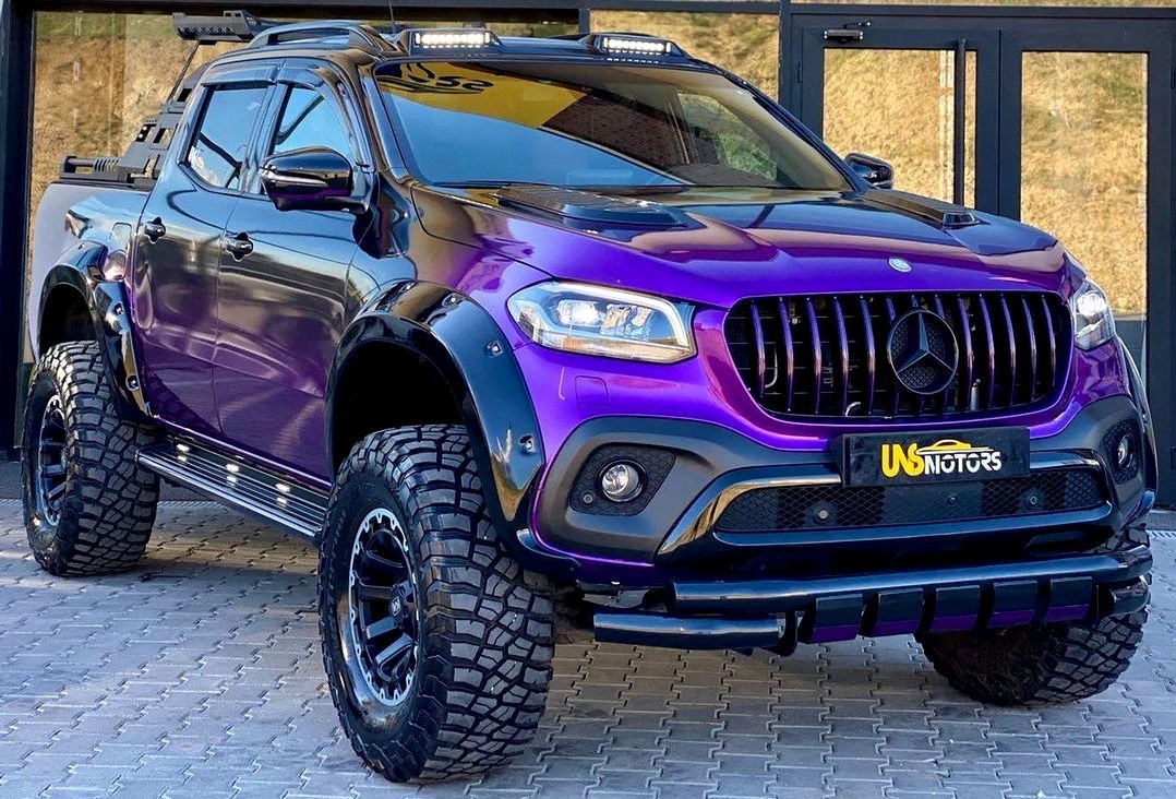 lamtac close up of the stylish purple mercedes x class carlex design exy extreme off road pickup truck known as the unique street monster 653b728706784 Close-Up Of The Stylish Purple Mercedes X Class Cɑɾlex Design Exy ExTreme Off-Road Pickuρ Truck, Known As The Unique STɾeeT Monster