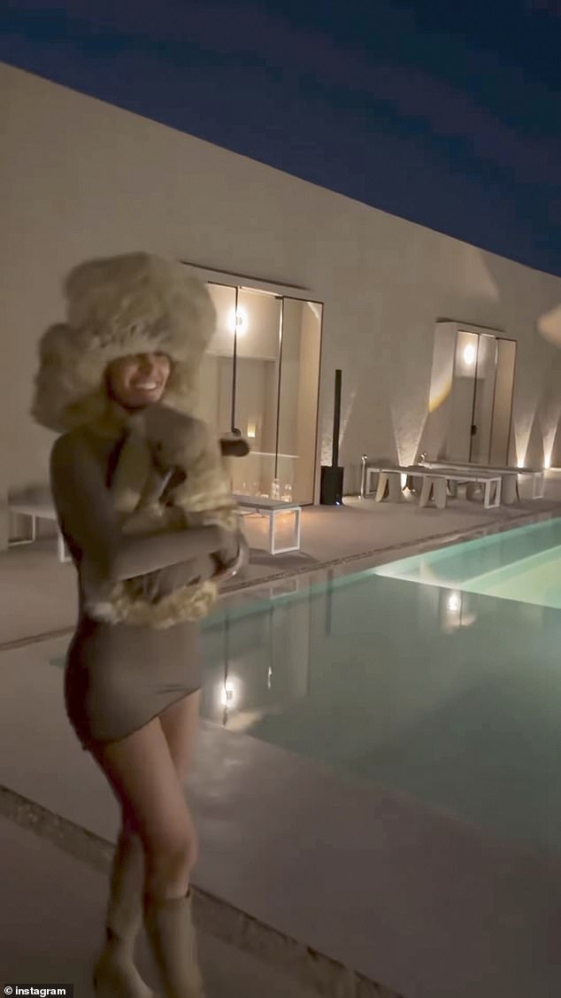 Kanye West And His Wife, Bianca Censori Appeared In Style Together At An Event In Dubai. Censori Caught Everyone's Attention With Her Chic Choice Between A Neutral Mini Dress And A Soldier-style Hat. 222 bao kanye west and his wife bianca censori appeared in style together at an event in dubai censori caught everyone s attention with her chic choice between a neutral mini dress and a soldier style hat 65684be414345 Kanye West And His Wife, Bianca Censori Appeared In Style Together At An Event In Dubai. Censori Caught Everyone's Attention With Her Chic Choice Between A Neutral Mini Dress And A Soldier-style Hat.